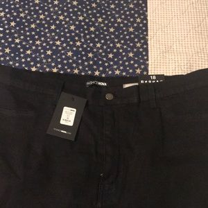 High waisted black stretchy jeans